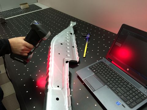 Laser scanning a formed part to compare against CAD